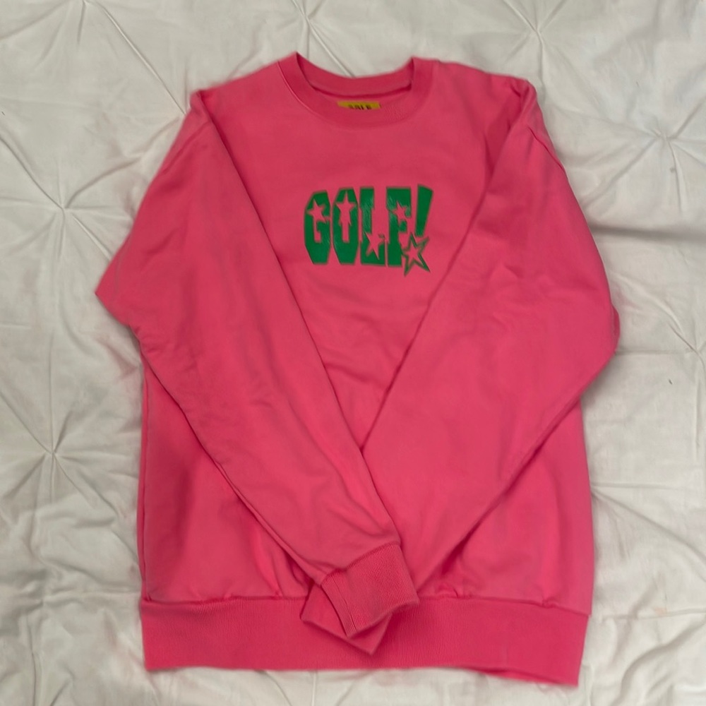 Pink GolfWang crew neck with green lettering on chest.  Runs small to size.